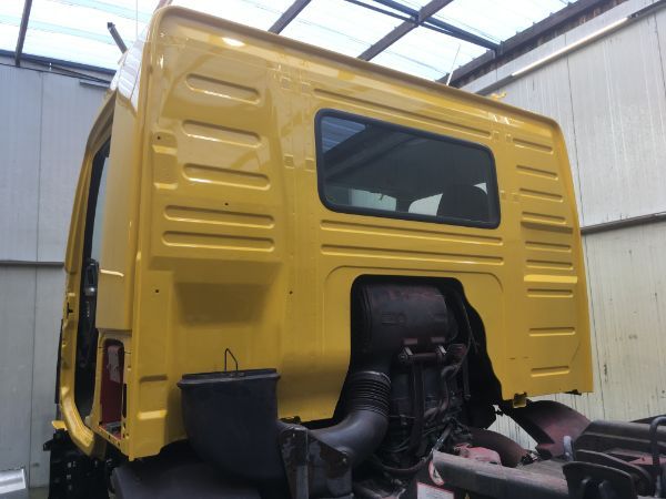 Gele grondwerkmachine