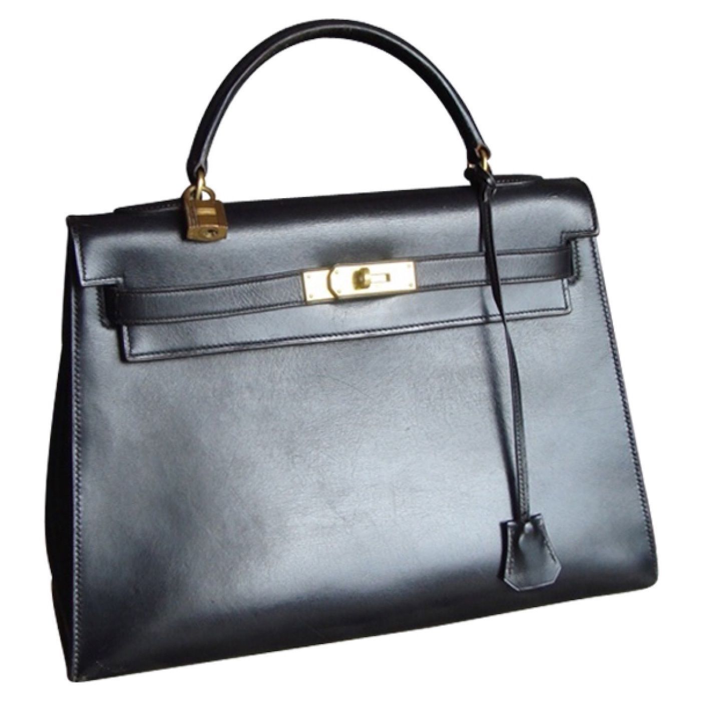 Photo d'un sac à main en cuir noir.