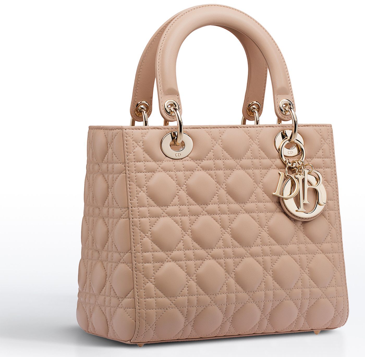 Photo d'un sac à main matelassé beige.