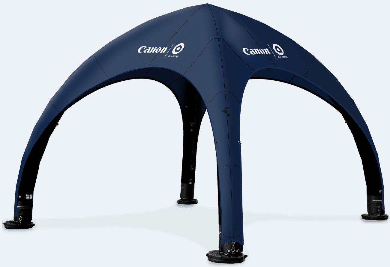 Blue inflatable canopy tent with four arched legs on a white background