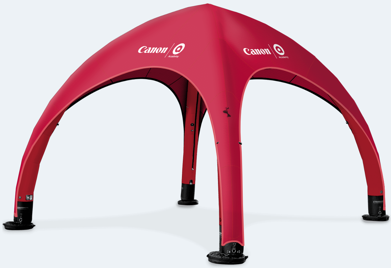 Red inflatable canopy tent with four legs on a white background
