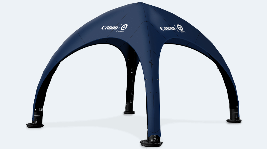 Blue four-legged canopy tent with Canon logos on a white background