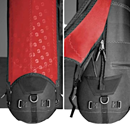 Black and red backpack bottom with straps, buckles, and side zipper pockets