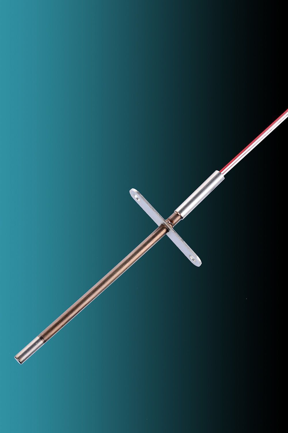 A cross with a red wire attached to it on a blue background.