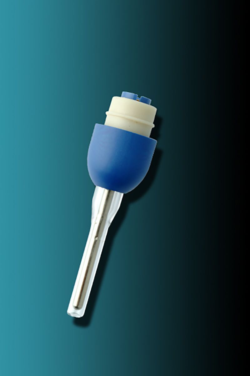 A blue and white object is sitting on a blue surface.