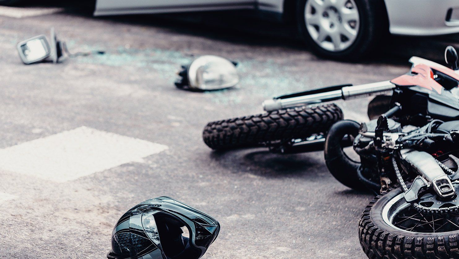 Moto par terre après un accident