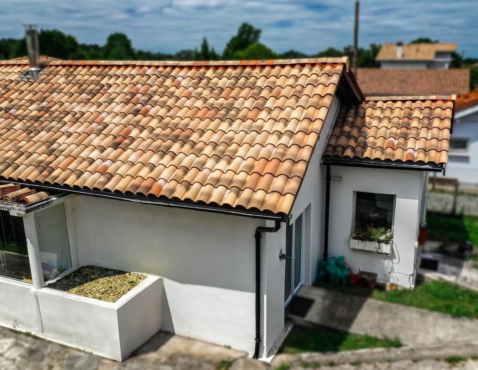Rénovation terminée d'une toiture en tuiles