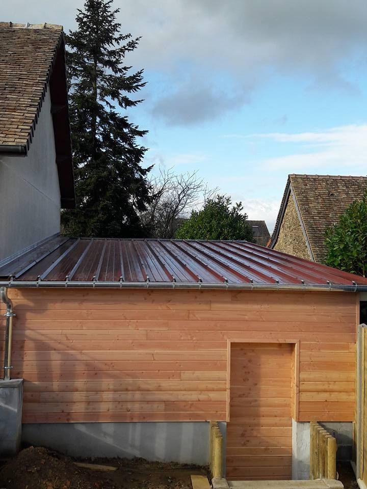 Extension de maison avec un toit en zinc