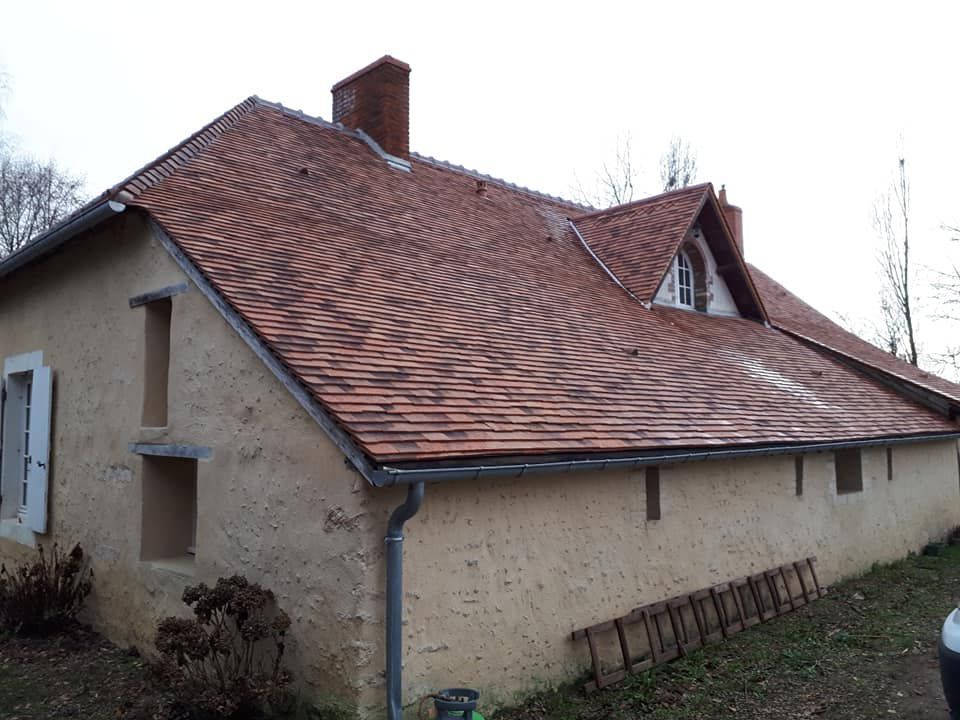 Refonte de toiture d'une ancienne maison