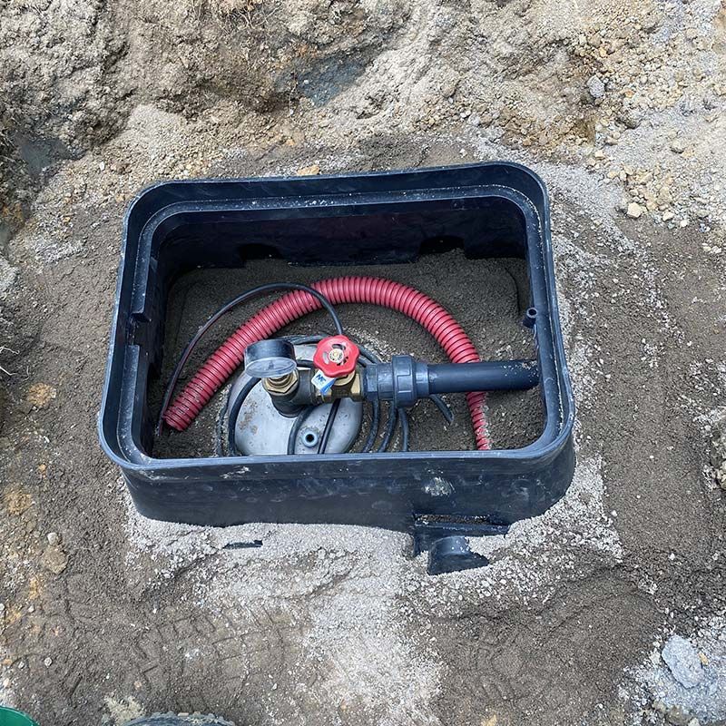 Système de pompe à eau installé sous le sol
