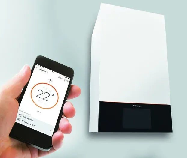 Un smartphone connecté à une chaudière