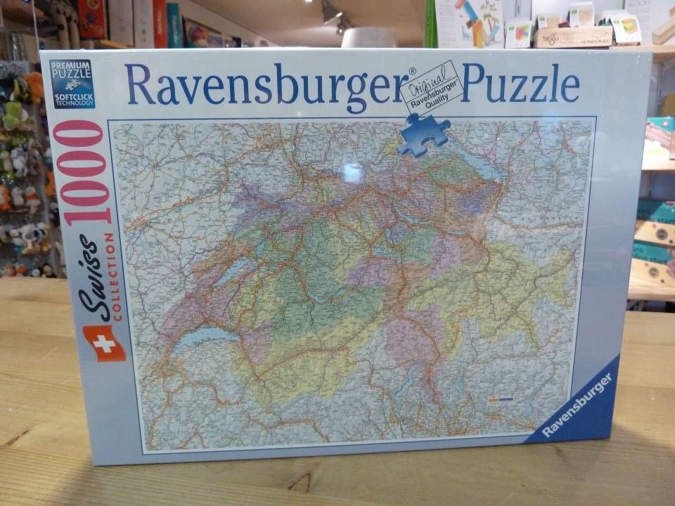 Boîte de puzzle Ravensburger de 1000 pièces avec une illustration de carte colorée sur une étagère de magasin