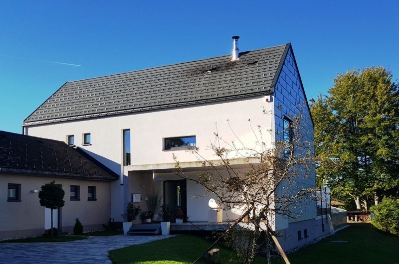 Modernes Holzhaus mit Putzfassade - Bild 2