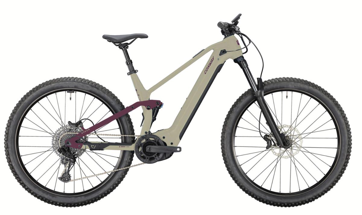 Auf einem weißen Hintergrund steht ein Fahrrad mit einem Motor an der Vorderseite.