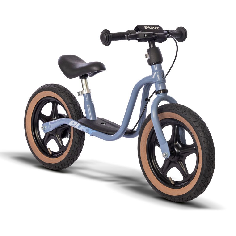 Ein blaues Laufrad mit braunen Reifen und einem schwarzen Sattel