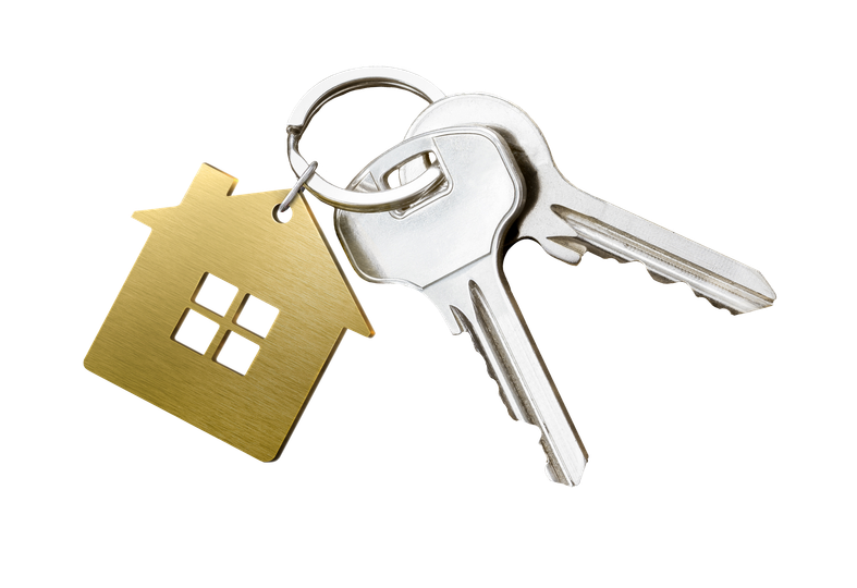 Clés avec un porte-clé en forme de maison