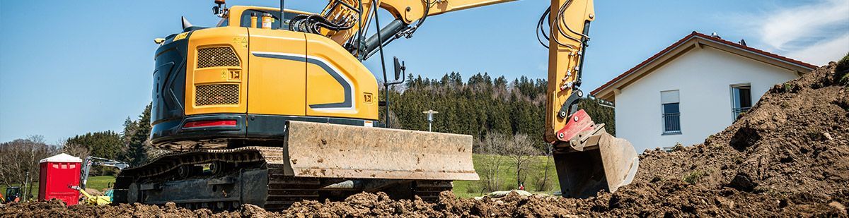 Travaux de terrassement réalisés par une pelleteuse