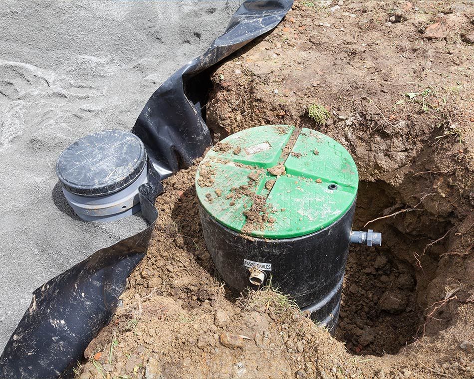 Chantier d'assainissement et mise en place d'une bouche d'égout