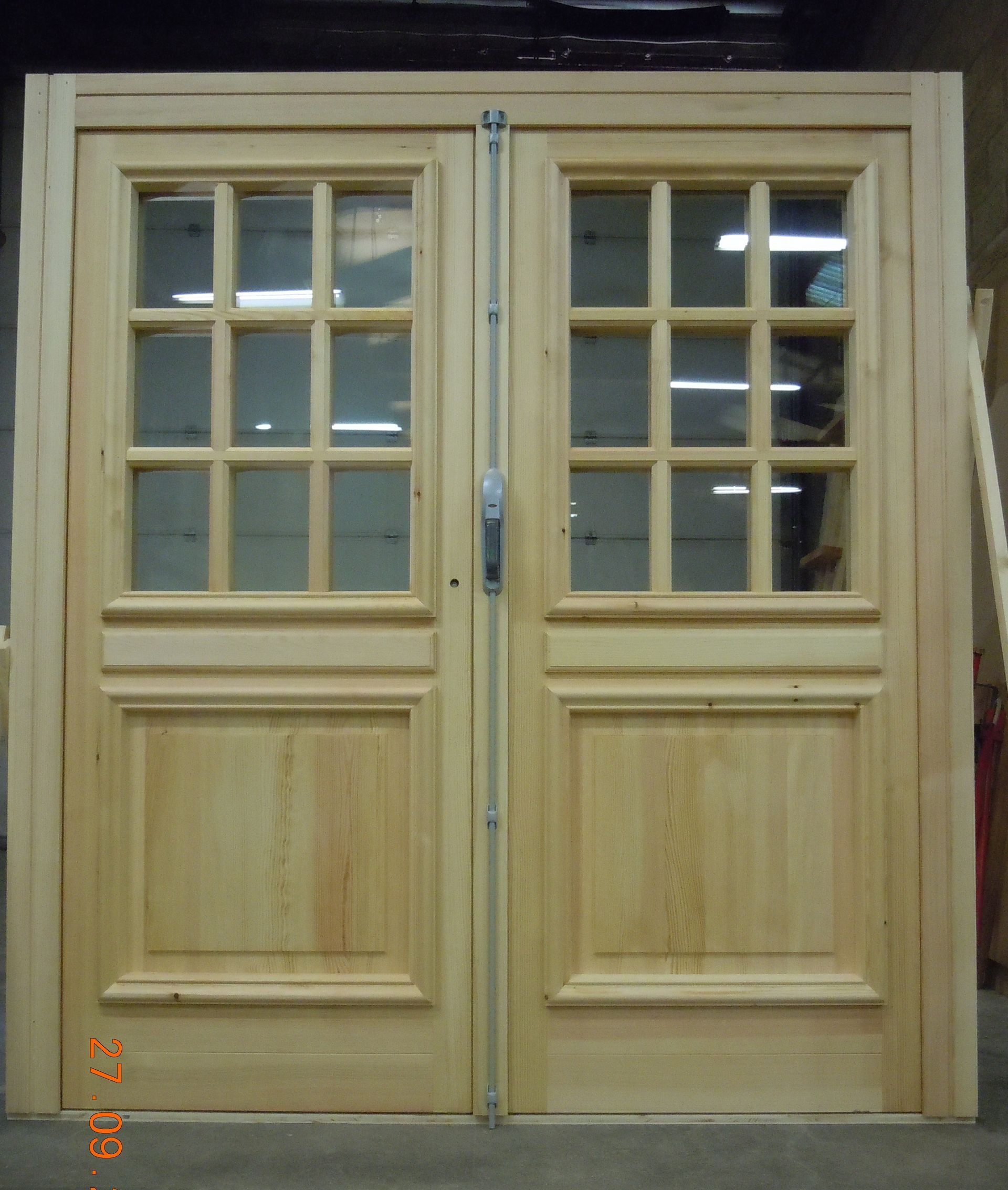 Double porte d'entrée en bois