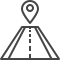 Señal de tráfico con un icono de chincheta de mapa sobre una carretera recta, que indica una ubicación o destino.