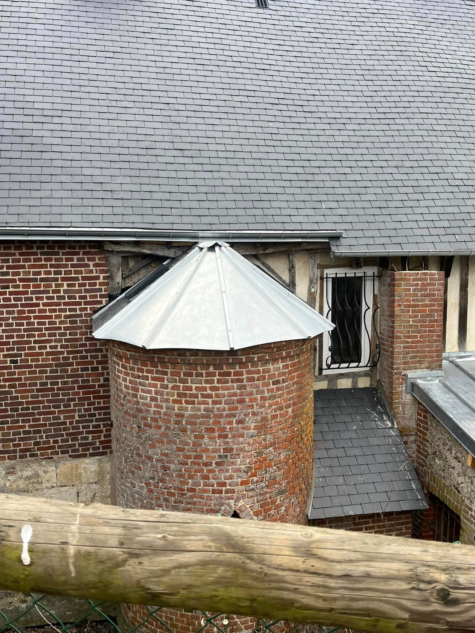 Rénovation d'une toiture en ardoise et d'une toiture en zinc