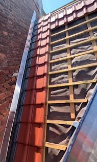 Mis en place d'une toiture en tuile en terre cuite