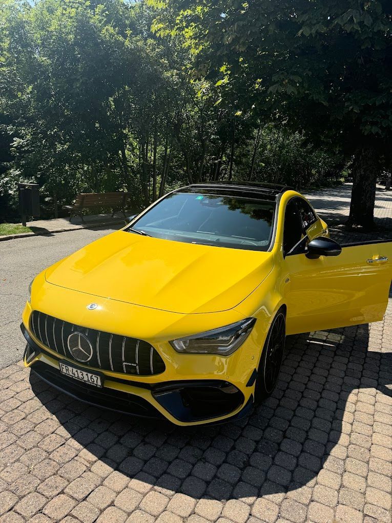 Une icône blanche avec une image d'une montagne sur fond gris.