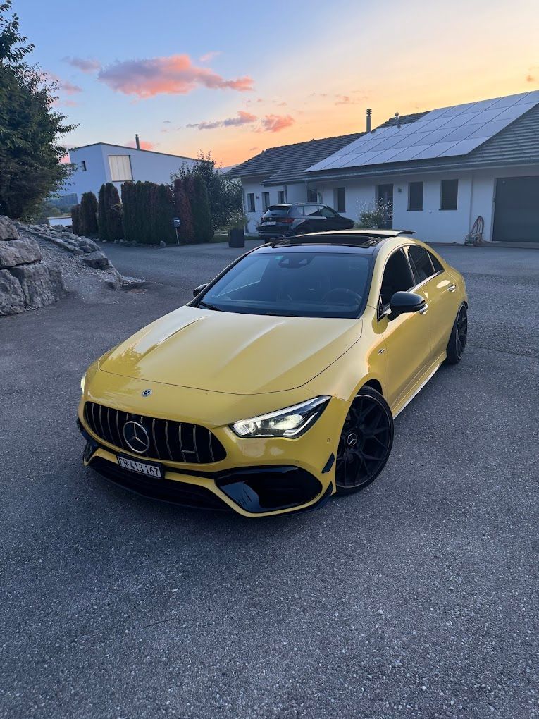 Une icône blanche avec une image d'une montagne sur fond gris.