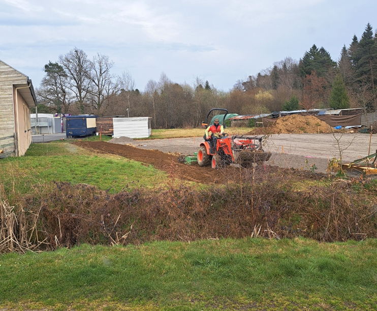 Tractopelle qui réalise un terrassement
