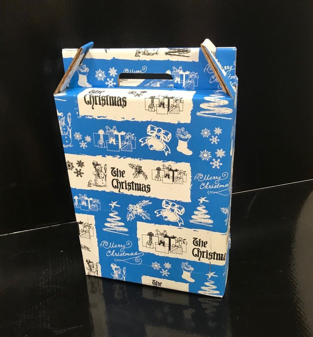 Un cuadro azul y blanco que dice feliz navidad