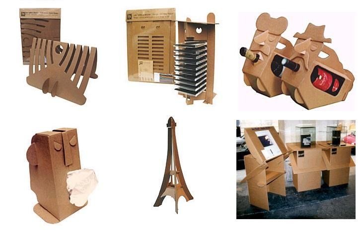 Un collage de objetos de cartón que incluye una Torre Eiffel.