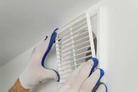 Installation d'une grille de ventilation