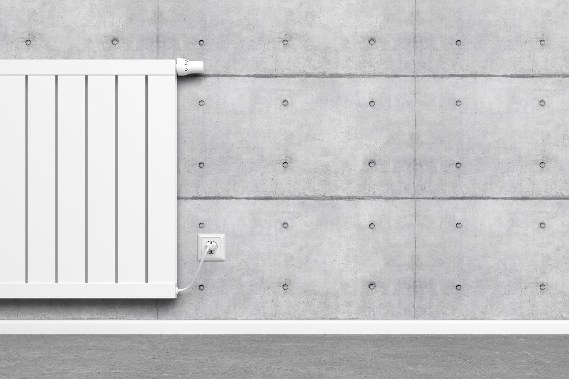 Radiateur électrique branché à un mur gris