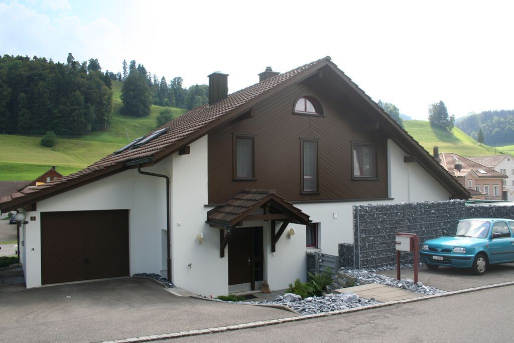 Referenzhaus Holz - Maler Kläger AG