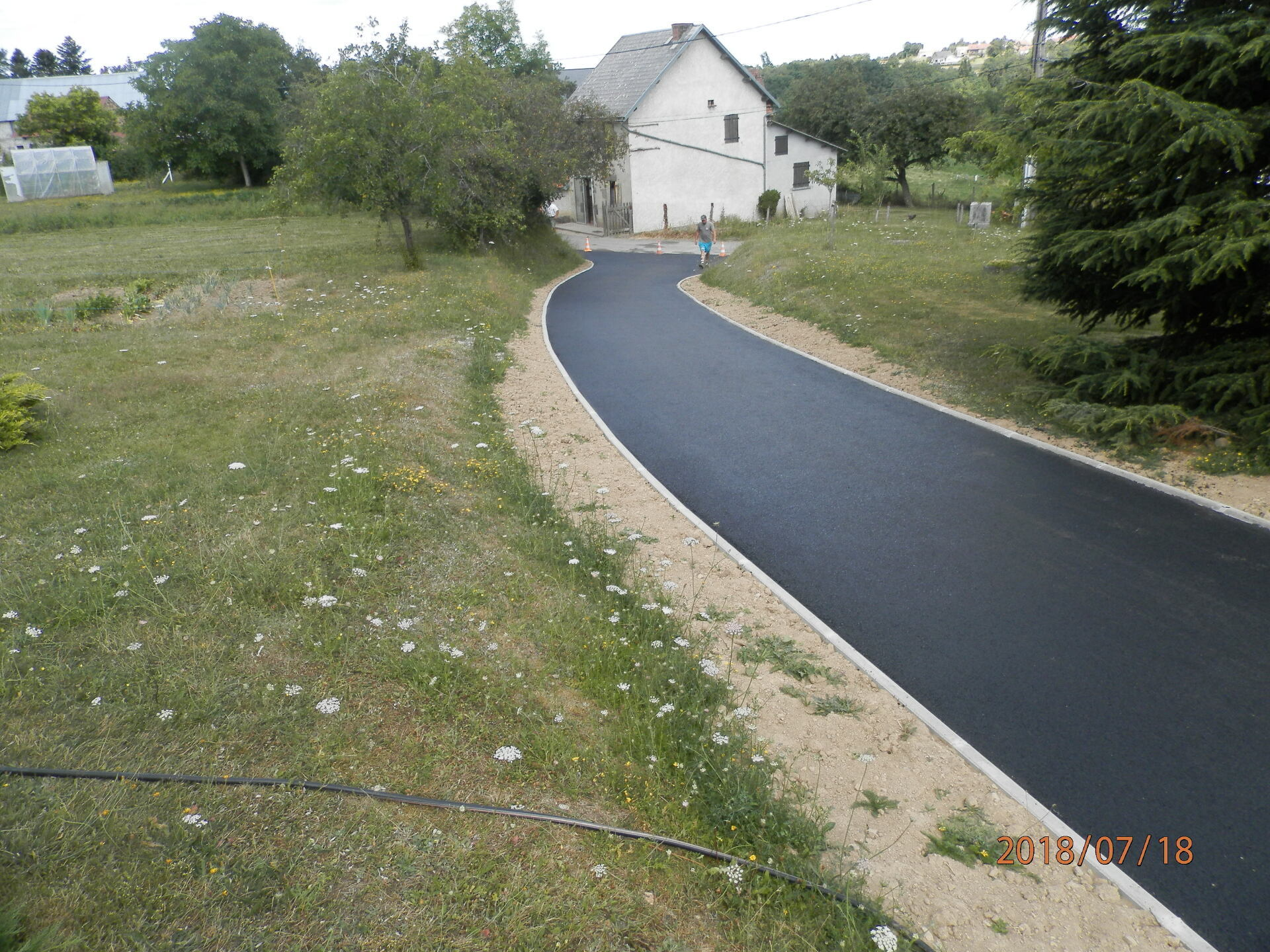Allée de maison en revêtement tri couche