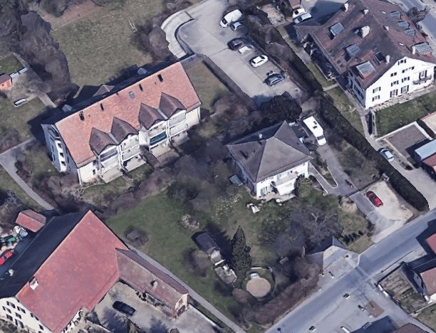 Une vue aérienne d'un quartier résidentiel avec beaucoup de maisons