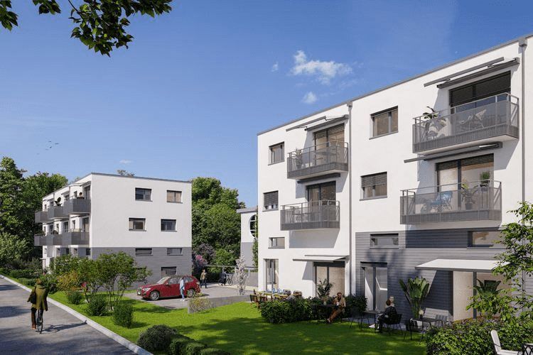 Une impression d'artiste d'un nouvel immeuble d'appartements avec une voiture rouge garée devant.