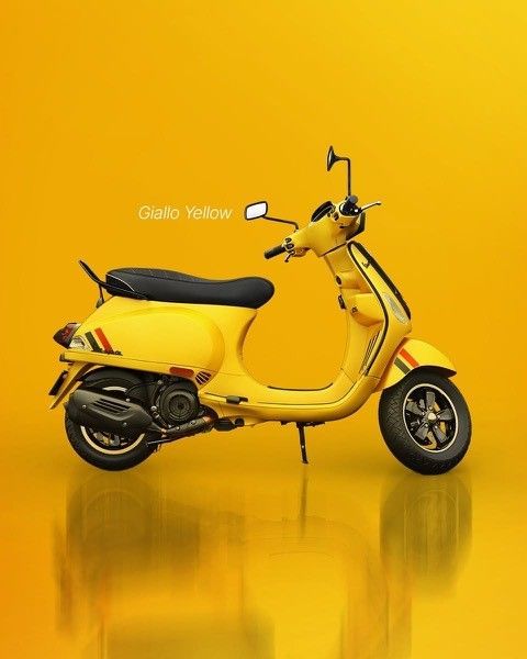 Gelber Vespa-Roller vor gelbem Hintergrund mit einer Spiegelung darunter.