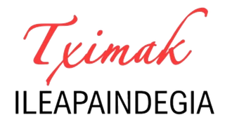 Escritura roja "Tximak" sobre negro "PELUQUERO".