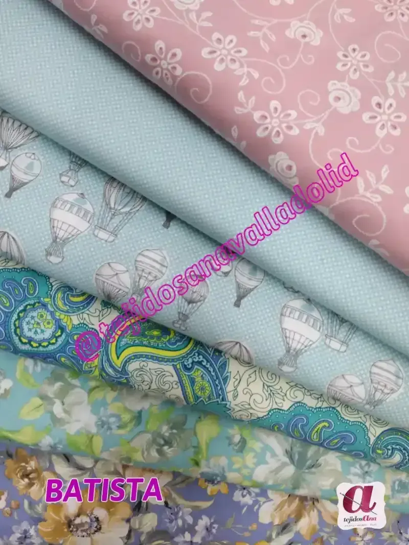 Una pila de telas con la palabra batista en la parte inferior.