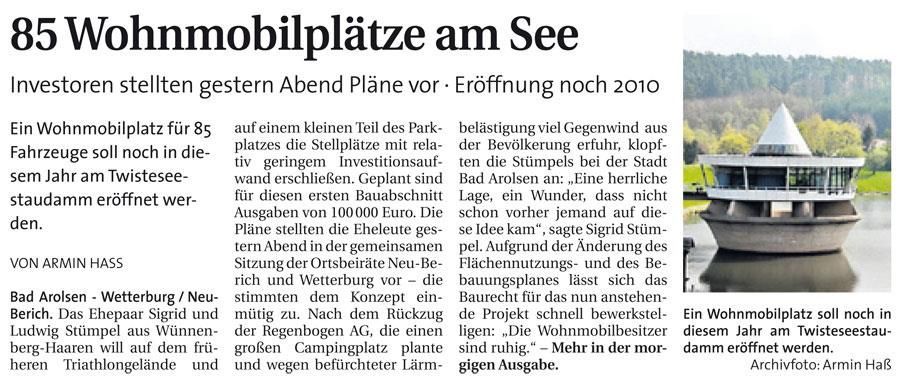 Ein Zeitungsartikel über ein Haus an einem See