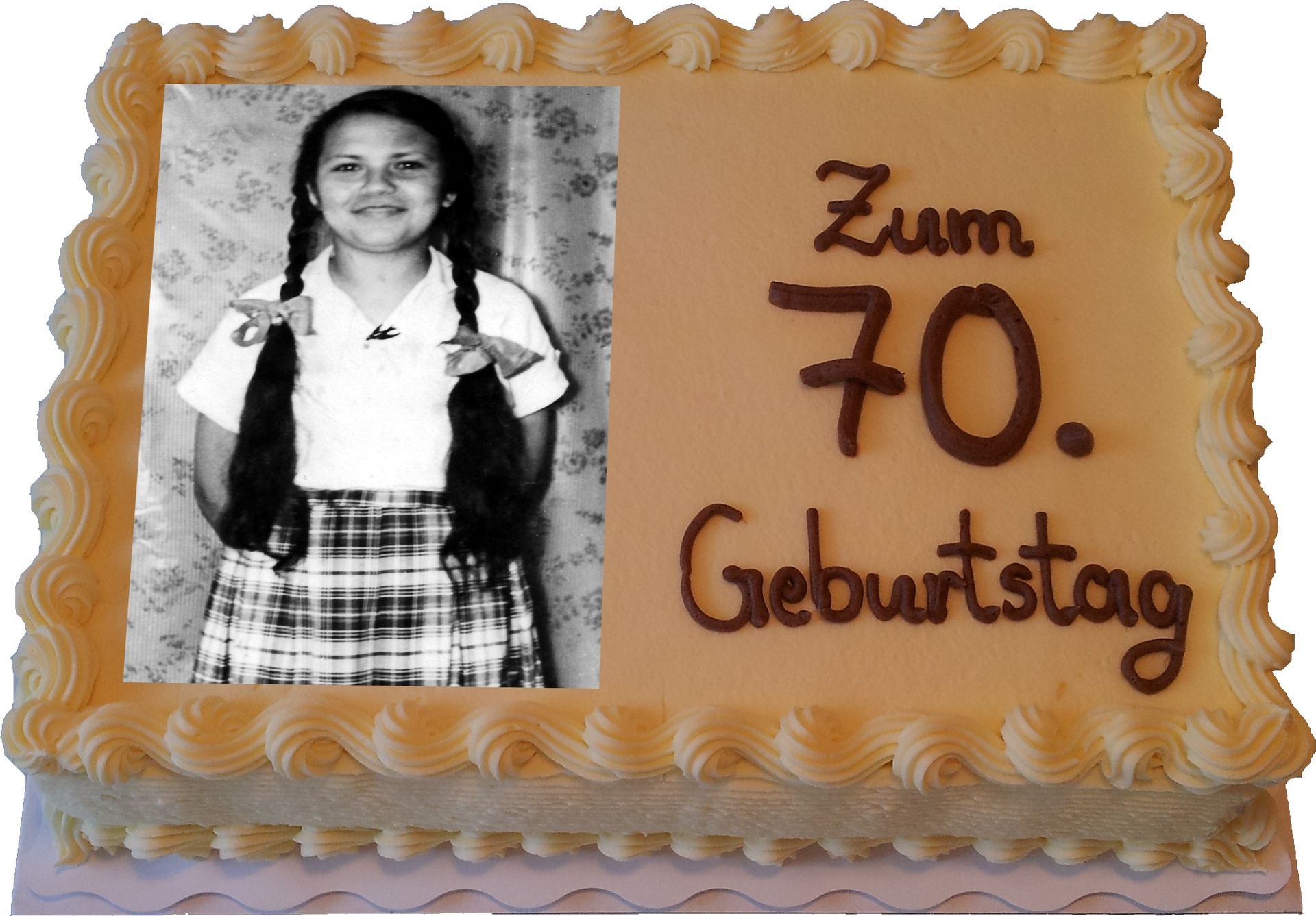 Eine Torte zum 70. Geburtstag mit dem Bild eines Mädchens darauf