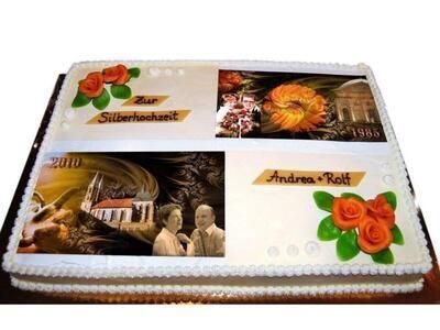 Ein Kuchen mit einem Bild von einem Mann und einer Frau darauf