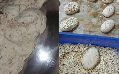 Eine Schüssel und ein Tablett mit Teig auf einem Tisch.