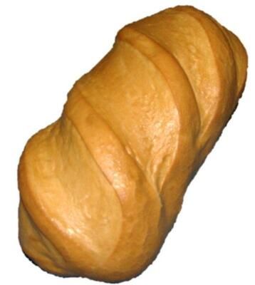 Eine Nahaufnahme von einem Laib Brot auf weißem Hintergrund