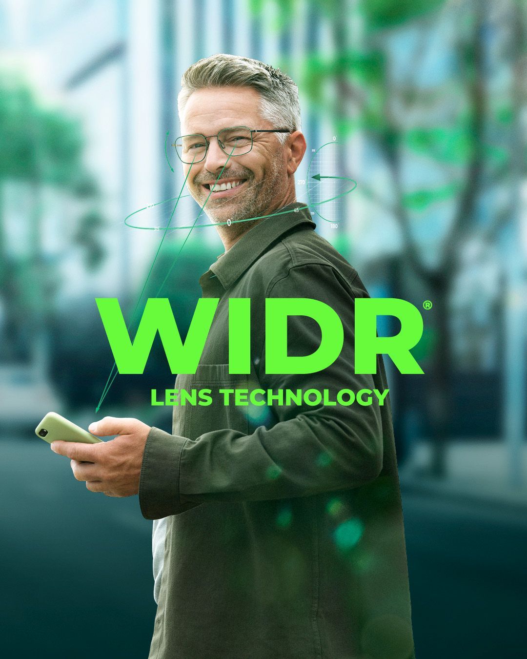 Ein Mann mit Brille hält ein Mobiltelefon.