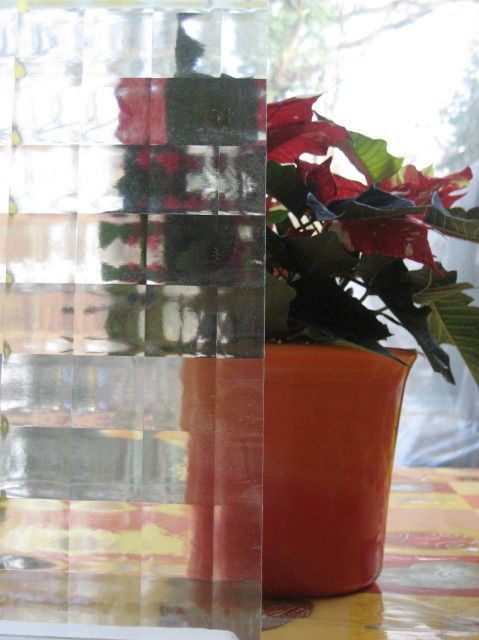 Blumentopf mit bemustertem Glas