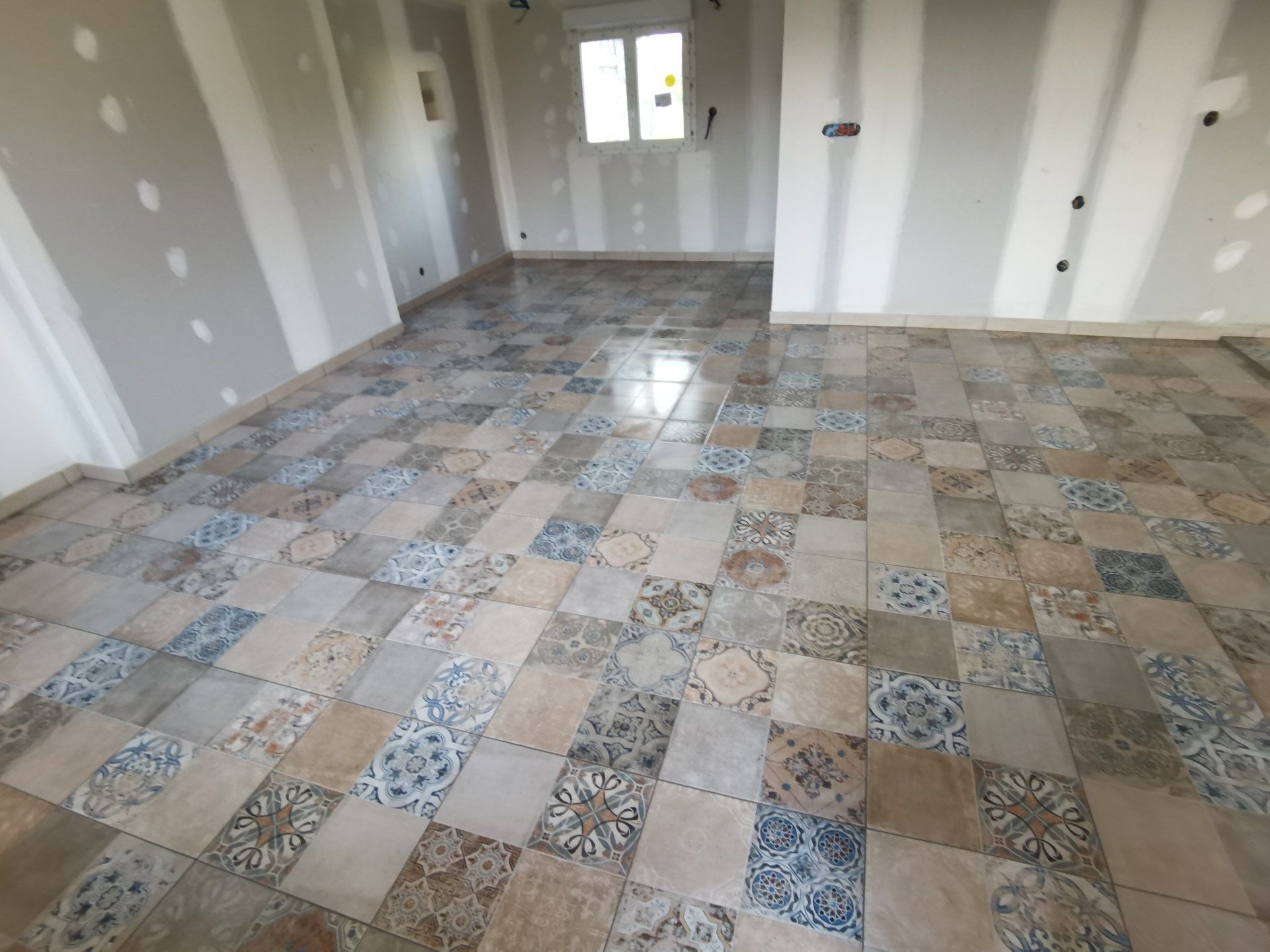 Travaux de carrelage et de plâtrerie