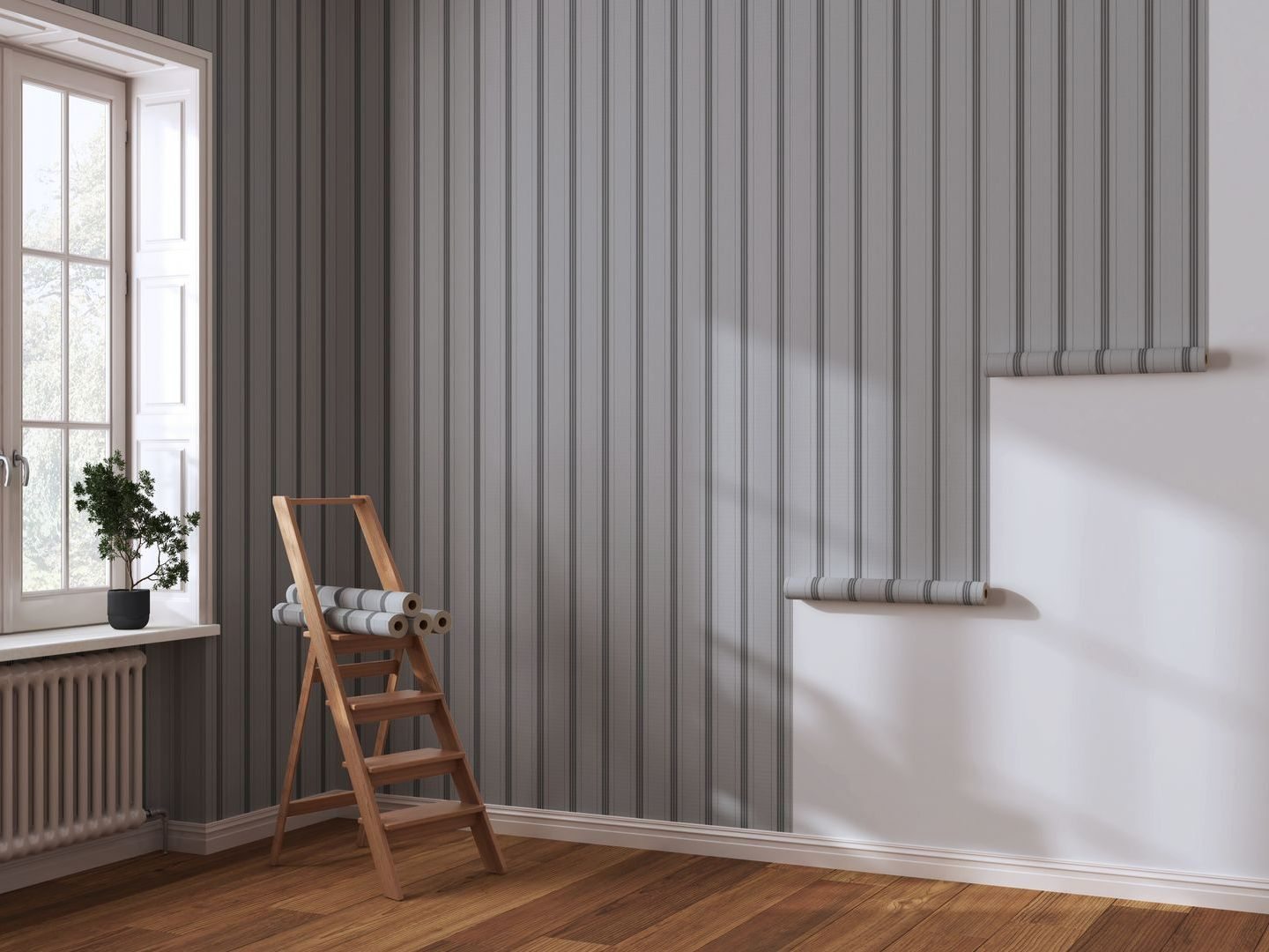 Mur avec papier peint à rayures en cours de pose