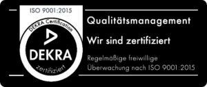 Ein schwarz-weißes Logo für das Dekra-Qualitätsmanagement